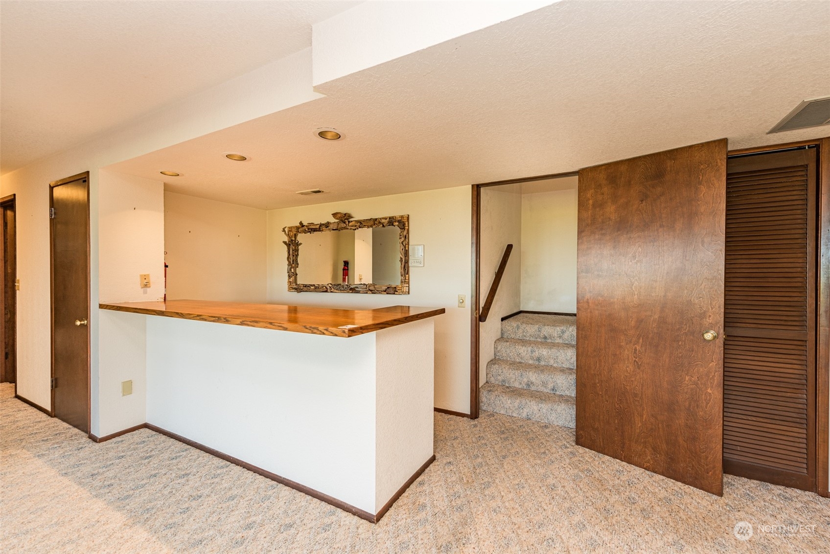 653 Brigadoon Boulevard Sequim, WA 98382 - Photo 25 of 40 a view of kitchen with cabinets and wooden floor