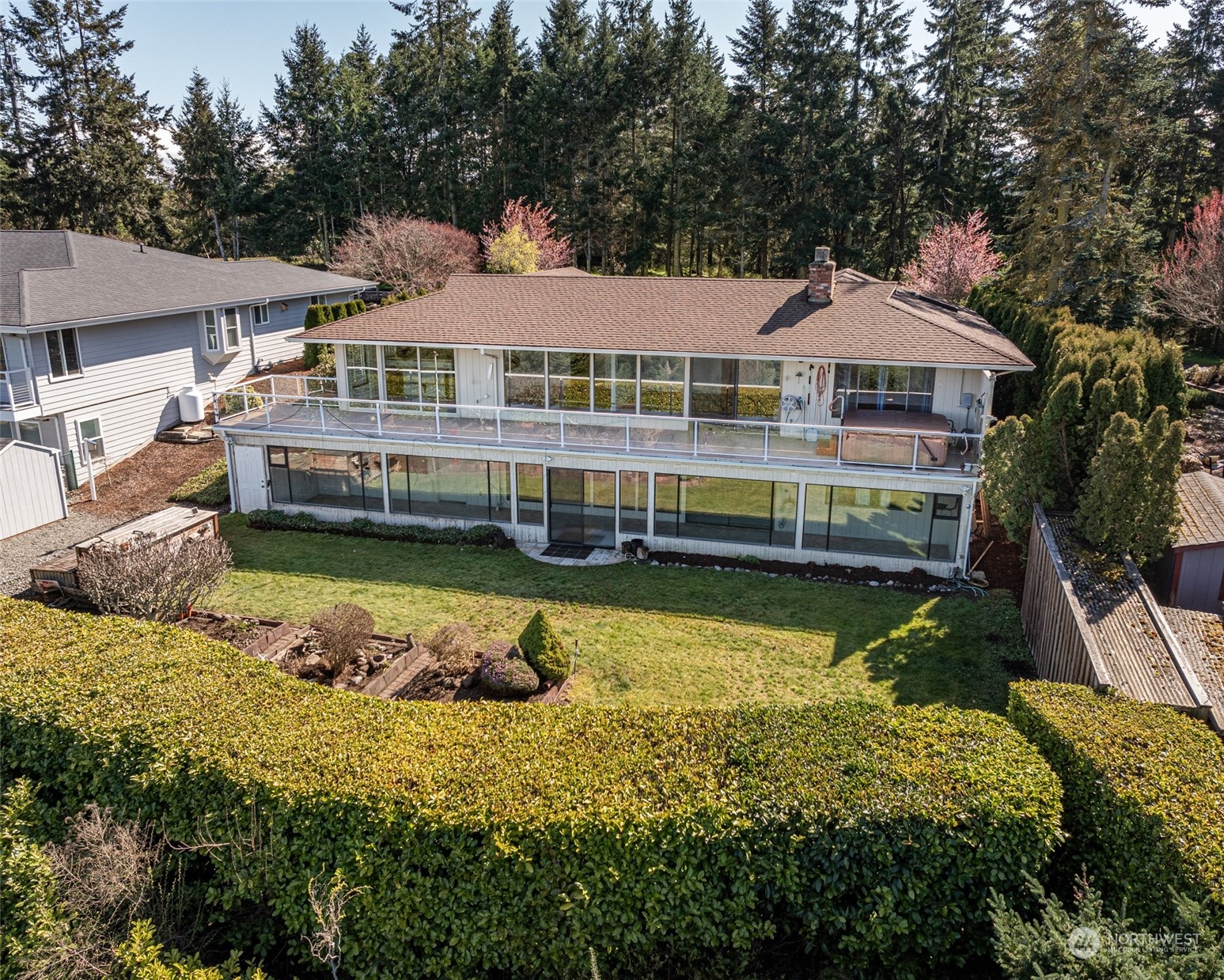 653 Brigadoon Boulevard Sequim, WA 98382 - Photo 33 of 40 a front view of a house with a yard