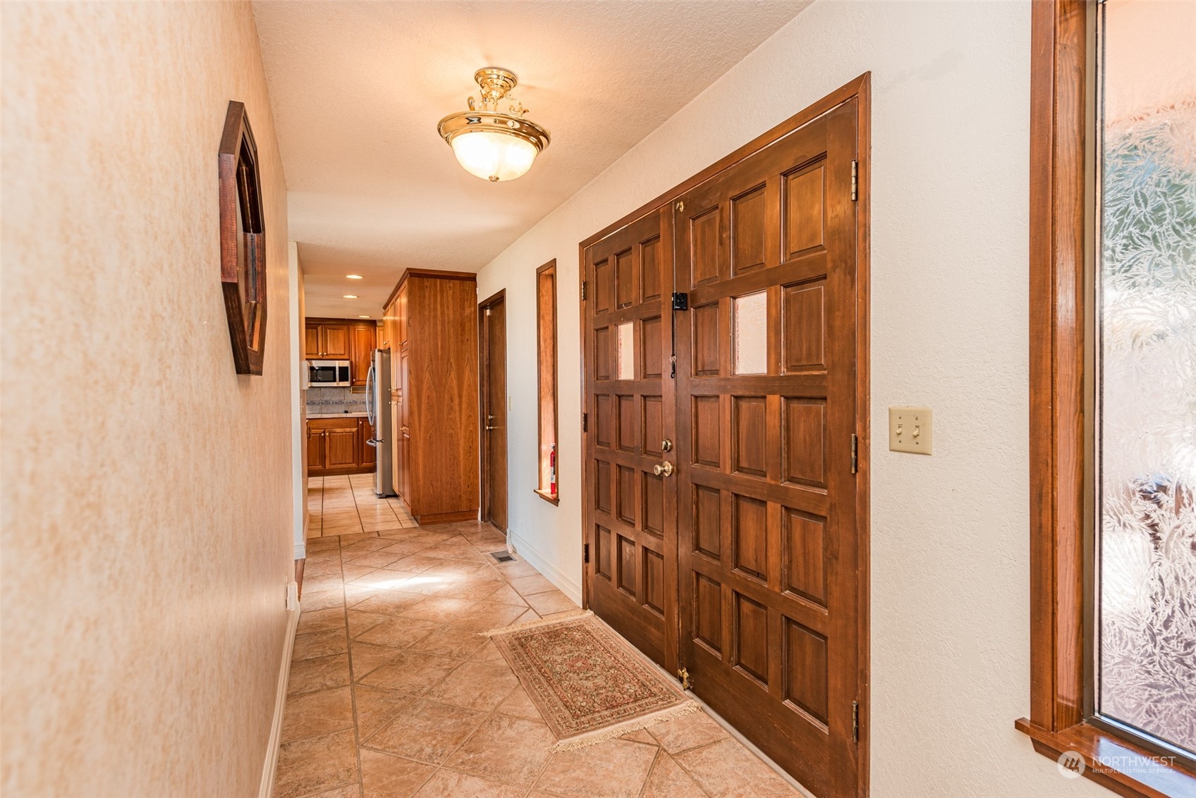 653 Brigadoon Boulevard Sequim, WA 98382 - Photo 4 of 40 a view of a hallway with closet area