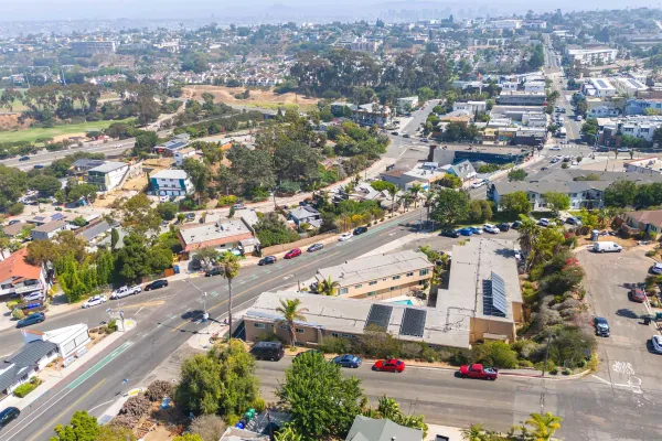 an aerial view of a city with lots of residential buildings