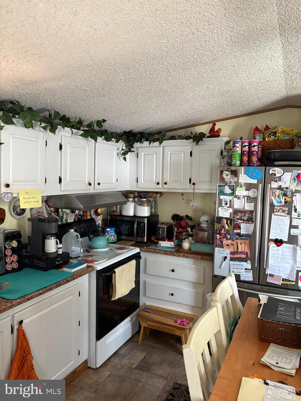 81 Spring Garden Estates Carlisle, PA 17015 - Photo 14 of 20 a kitchen with cabinets and window