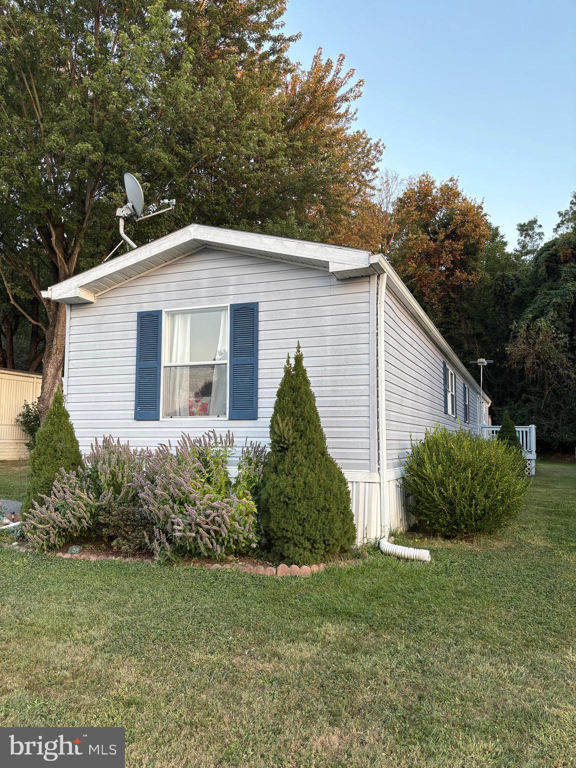 81 Spring Garden Estates Carlisle, PA 17015 - Photo 6 of 20 a front view of a house with garden