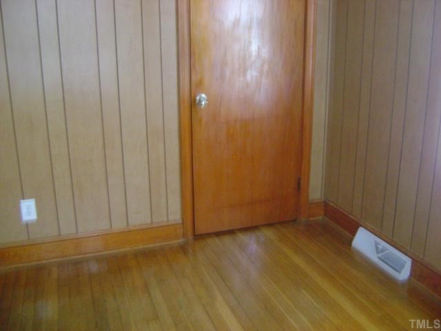 2168 Surl Mount Tirzah Road Timberlake, NC 27583 - Photo 4 of 12 a view of an empty room with wooden floor