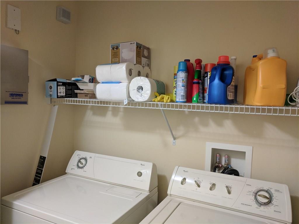 1645 Southeast Pomeroy Street, Unit 42 Stuart, FL 34997 - Photo 19 of 29 a utility room with dryer and washer