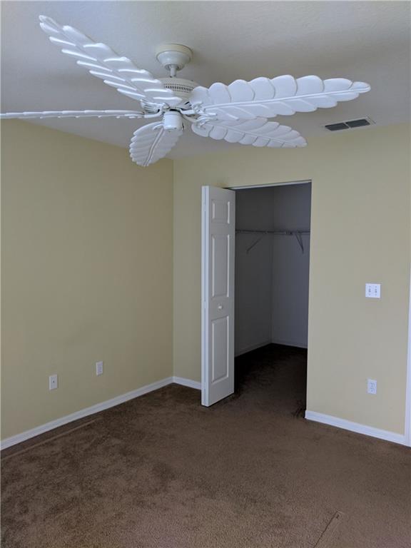 1645 Southeast Pomeroy Street, Unit 42 Stuart, FL 34997 - Photo 22 of 29 a view of a room with a fan