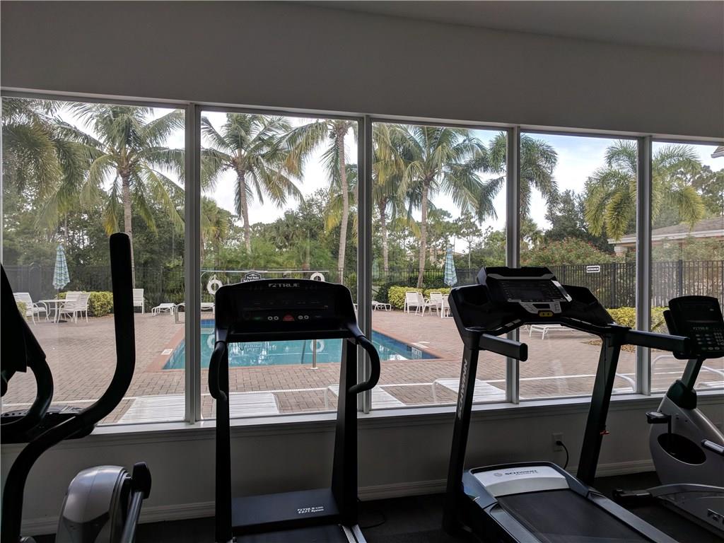 1645 Southeast Pomeroy Street, Unit 42 Stuart, FL 34997 - Photo 26 of 29 a view of a room with gym equipment
