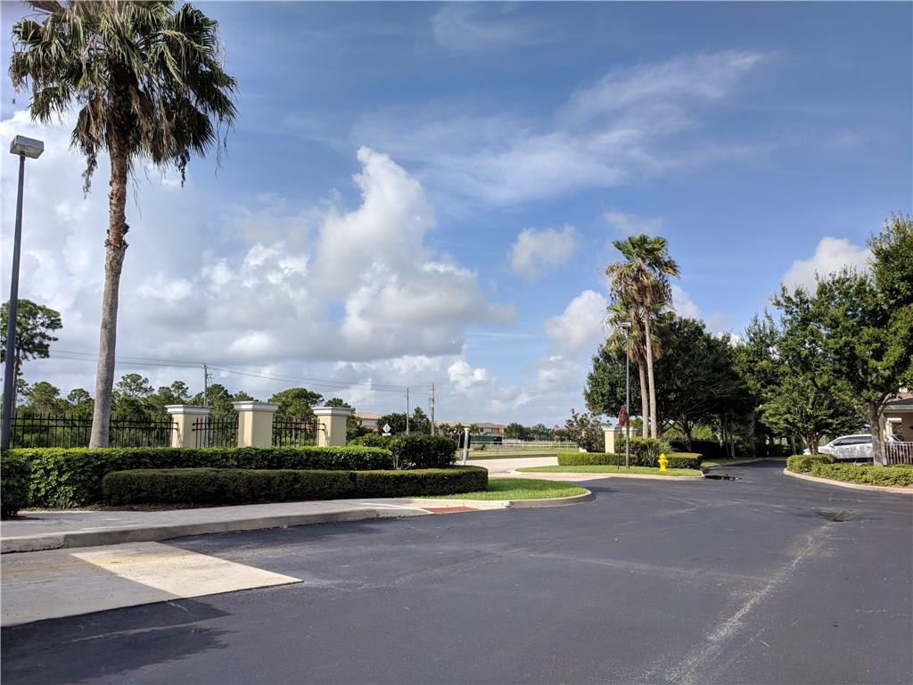 1645 Southeast Pomeroy Street, Unit 42 Stuart, FL 34997 - Photo 28 of 29 a view of swimming pool is middle in the garden