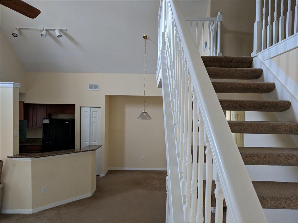 1645 Southeast Pomeroy Street, Unit 42 Stuart, FL 34997 - Photo 10 of 29 a view of entryway and hall with wooden floor