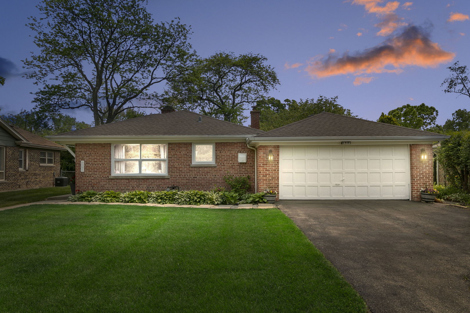 1717 Dundee Road Northbrook, IL 60062 - Photo 1 of 1 a front view of a house with a garden