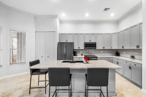 a workspace with furniture and window