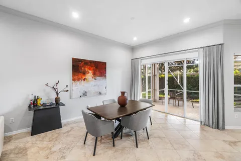 a bedroom with a bed and a television