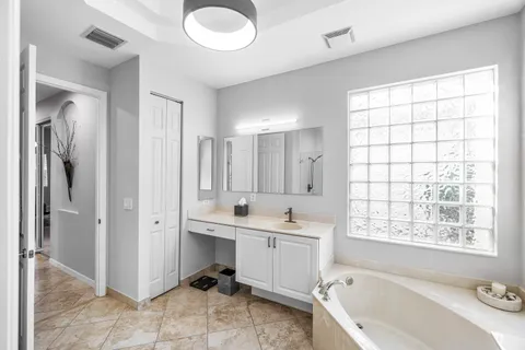 a view of a livingroom with furniture and gym equipment