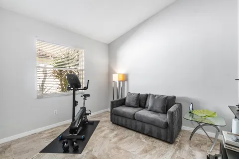 a view of parking garage with cars