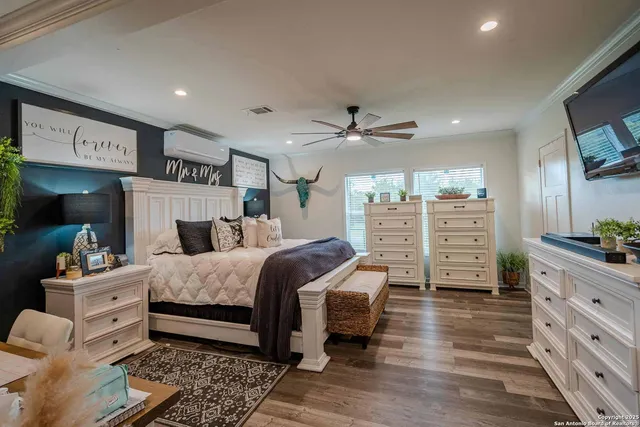 a bedroom with a bed and furniture