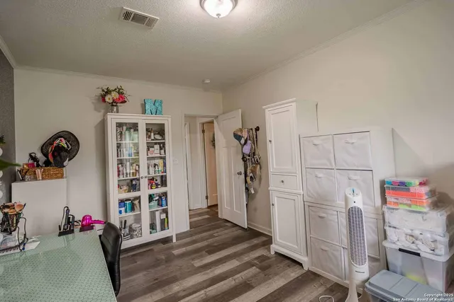 a store room with lots of clutter and storage