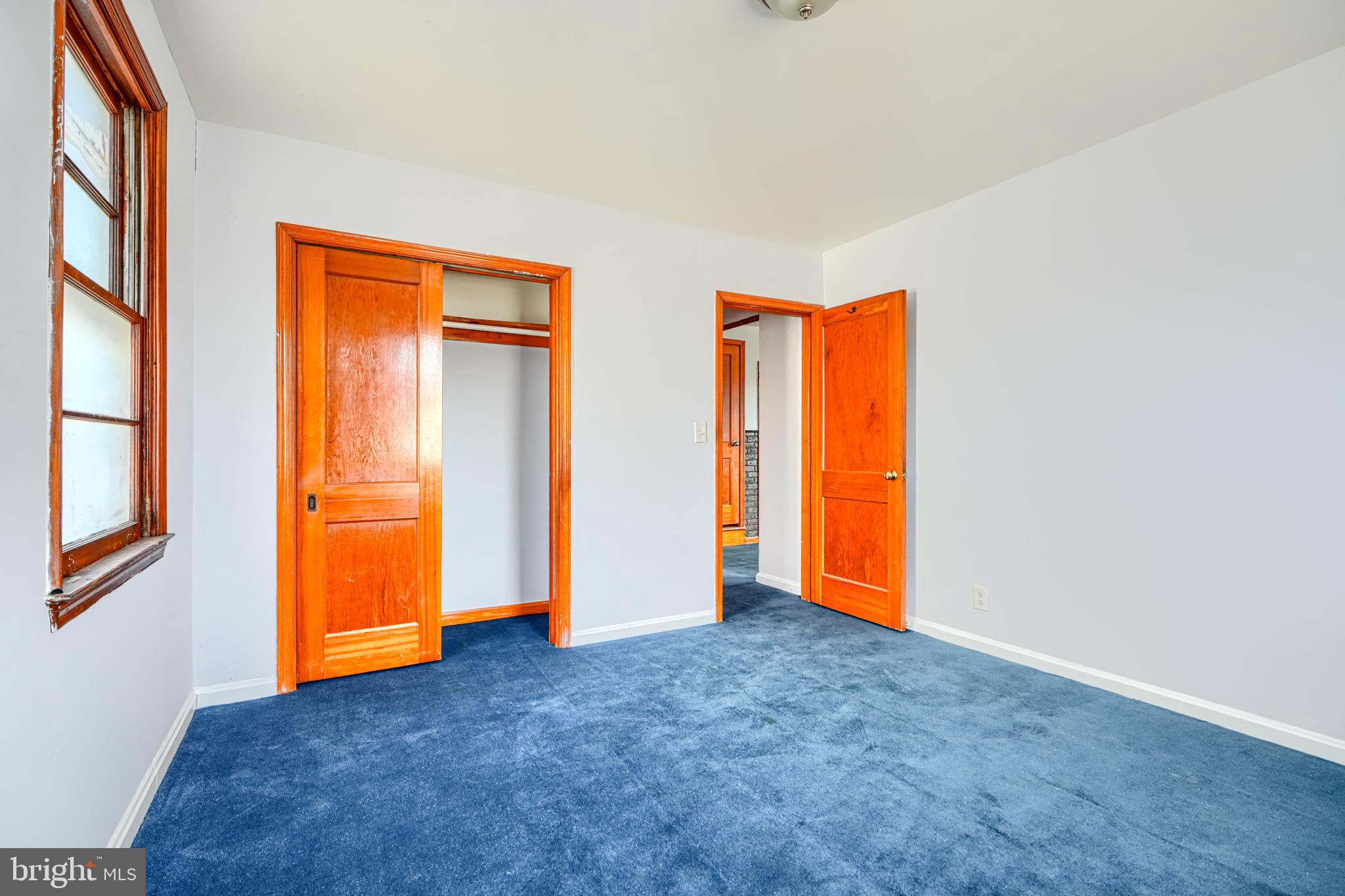 7839 Birmingham Avenue Baltimore, MD 21234 - Photo 11 of 24 an empty room with windows and closet