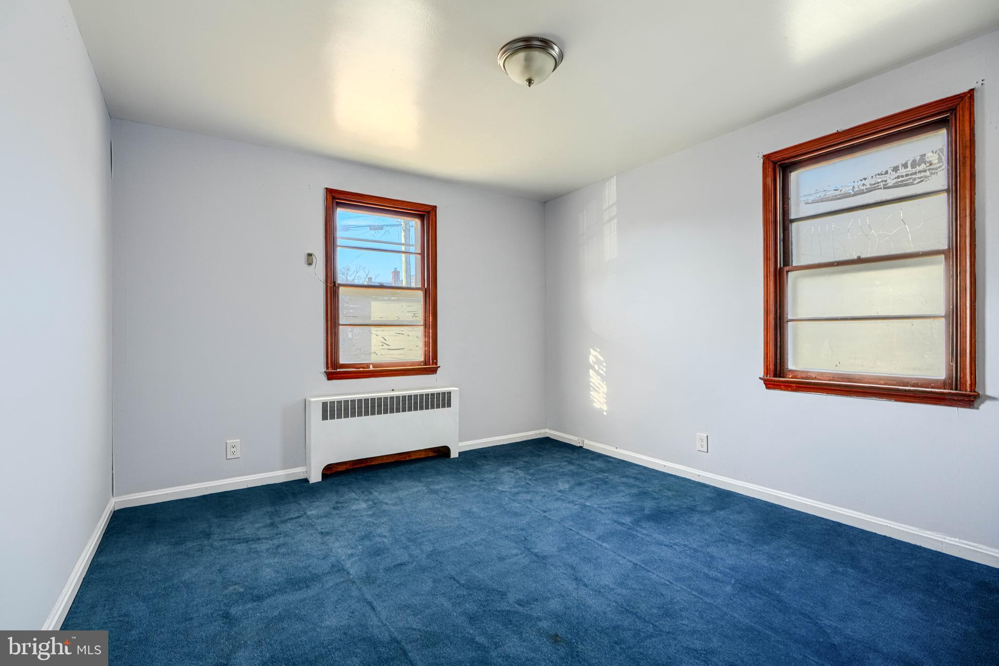 7839 Birmingham Avenue Baltimore, MD 21234 - Photo 10 of 24 an empty room with windows