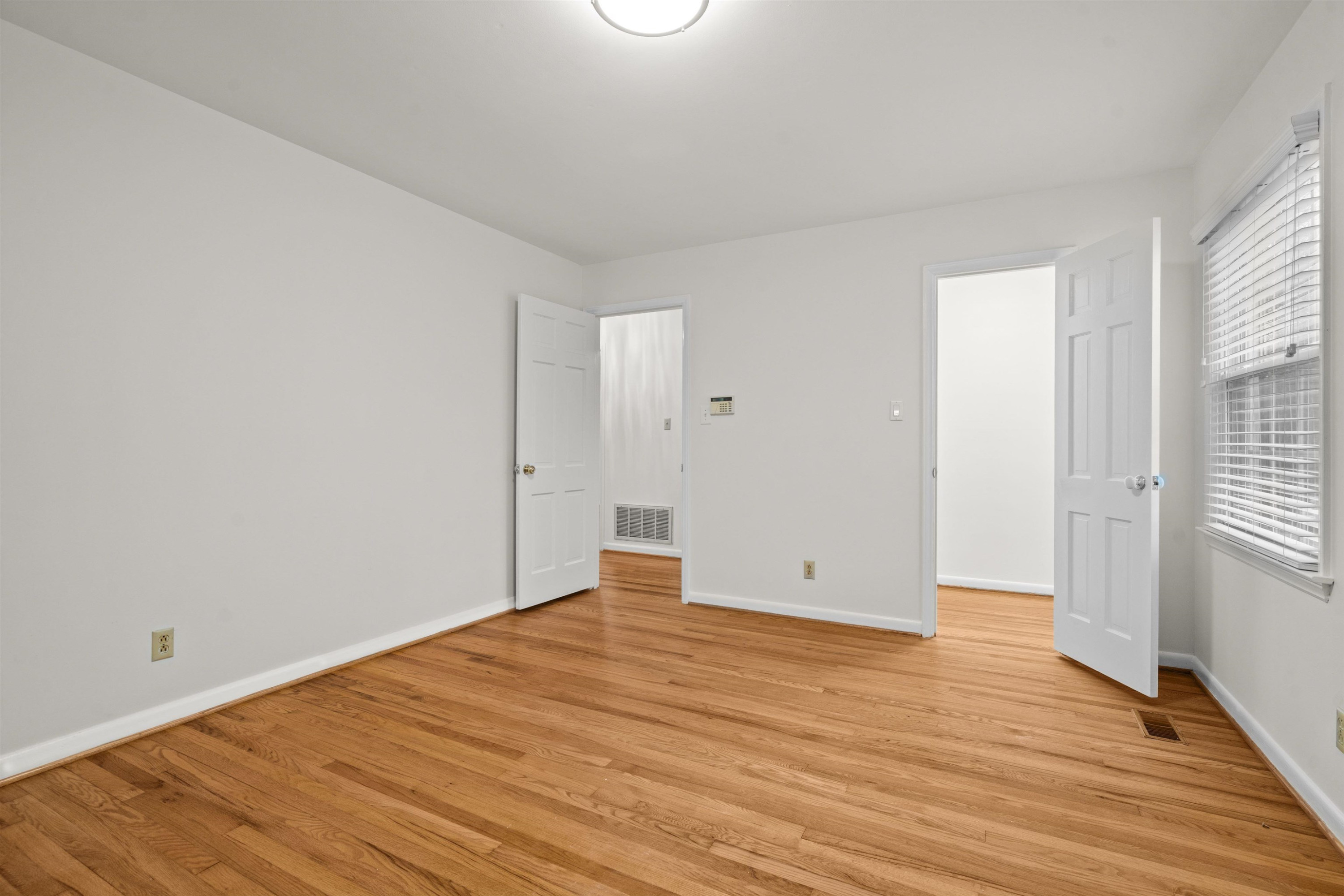 309 Glen Valley Road Raleigh, NC 27609 - Photo 21 of 34 Primary Bedroom has a walk-in closet and en suite bathroom. Primary Bedroom