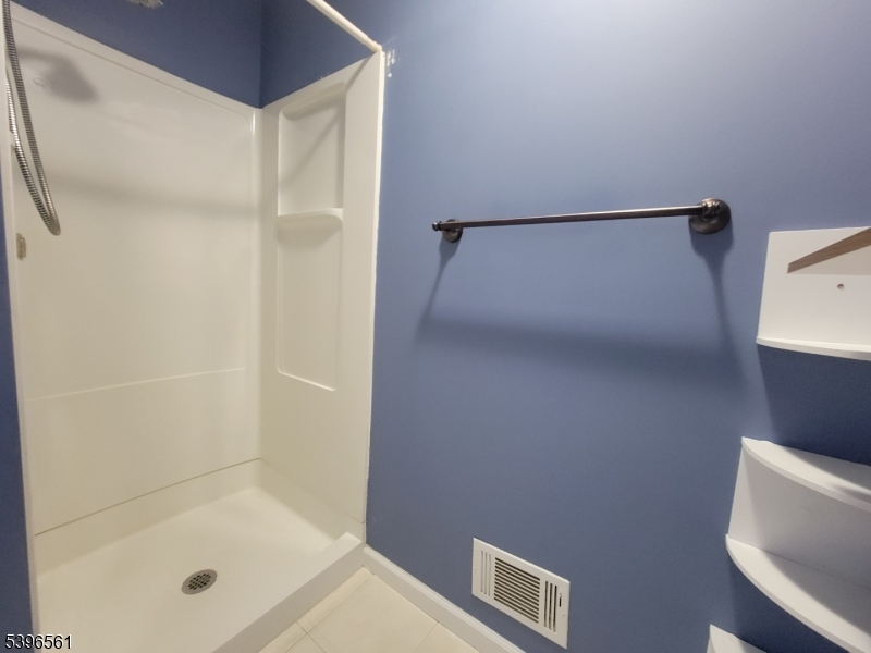 272 Us Highway, Unit C Andover, NJ 07821 - Photo 19 of 27 a bathroom with a shower