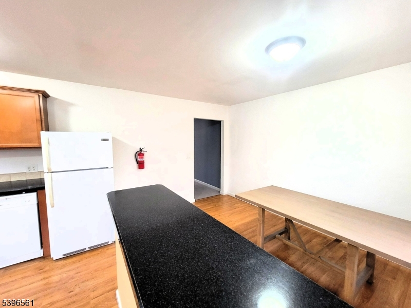 272 Us Highway, Unit C Andover, NJ 07821 - Photo 22 of 27 a bedroom with a bed and a dresser