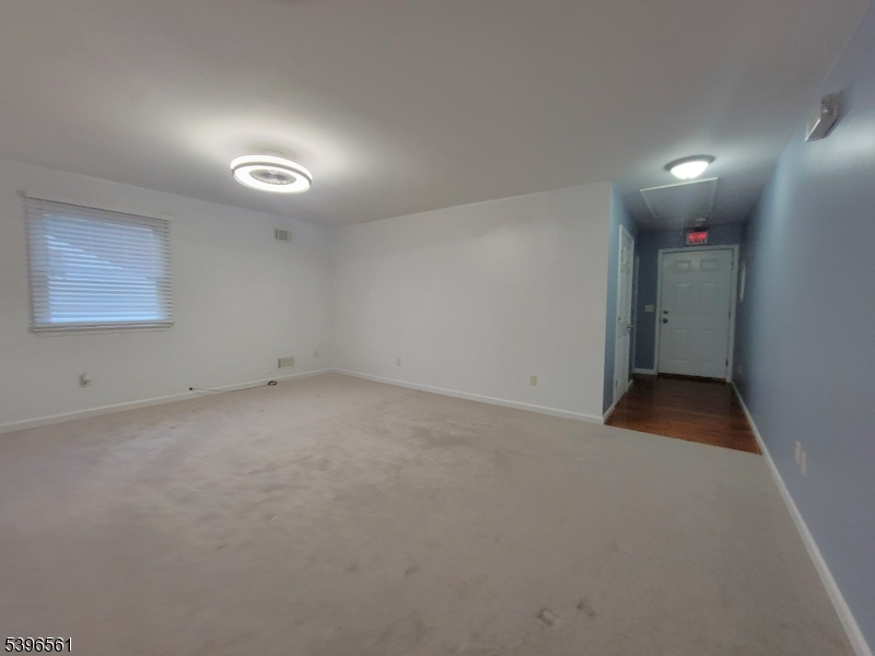 272 Us Highway, Unit C Andover, NJ 07821 - Photo 23 of 27 an empty room with a empty space and windows