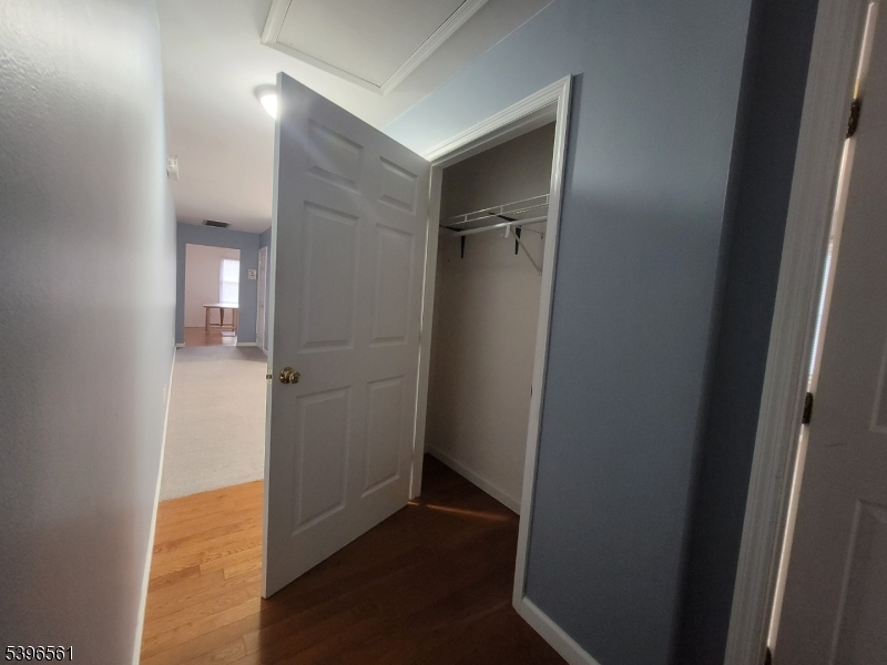 272 Us Highway, Unit C Andover, NJ 07821 - Photo 24 of 27 a view of hallway with wooden floor