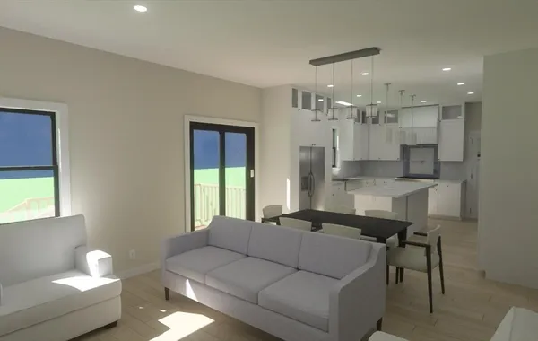 a kitchen with a stove and white cabinets