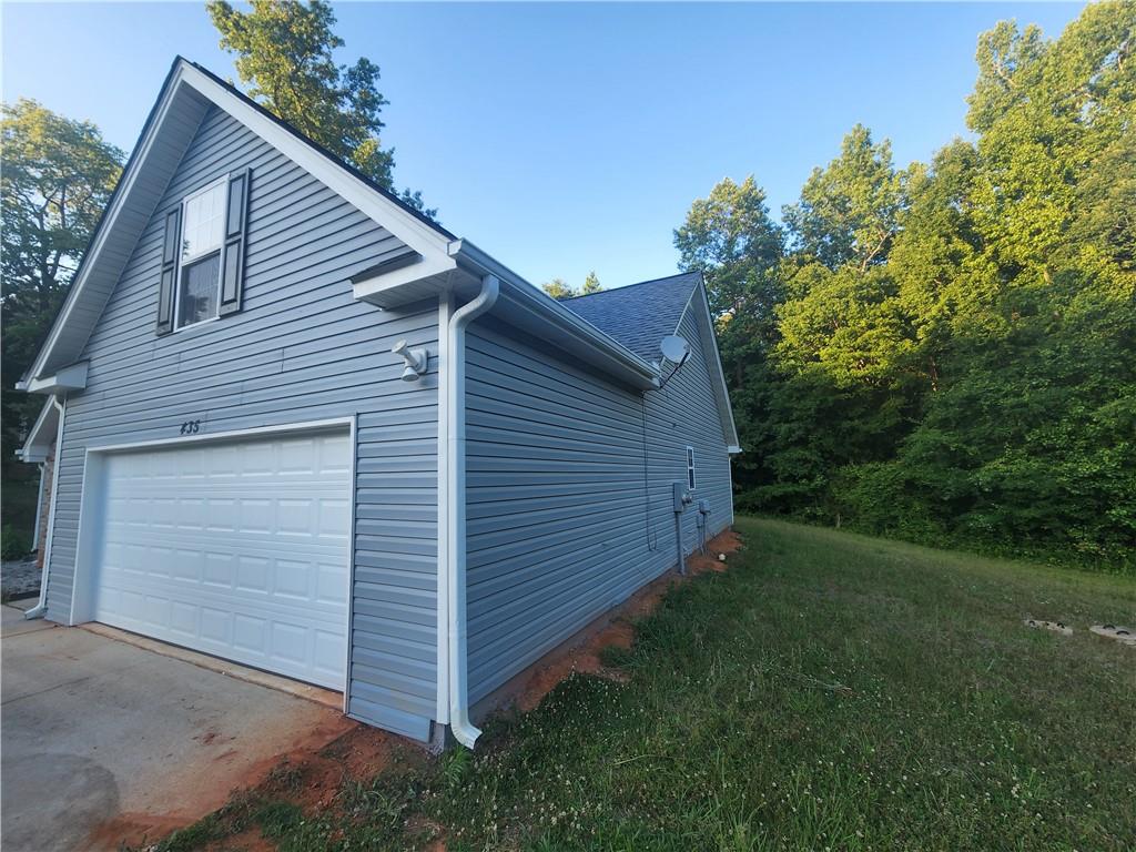 435 Butler Bridge Circle Covington, GA 30016 - Photo 23 of 25 a view of backyard of house with green space
