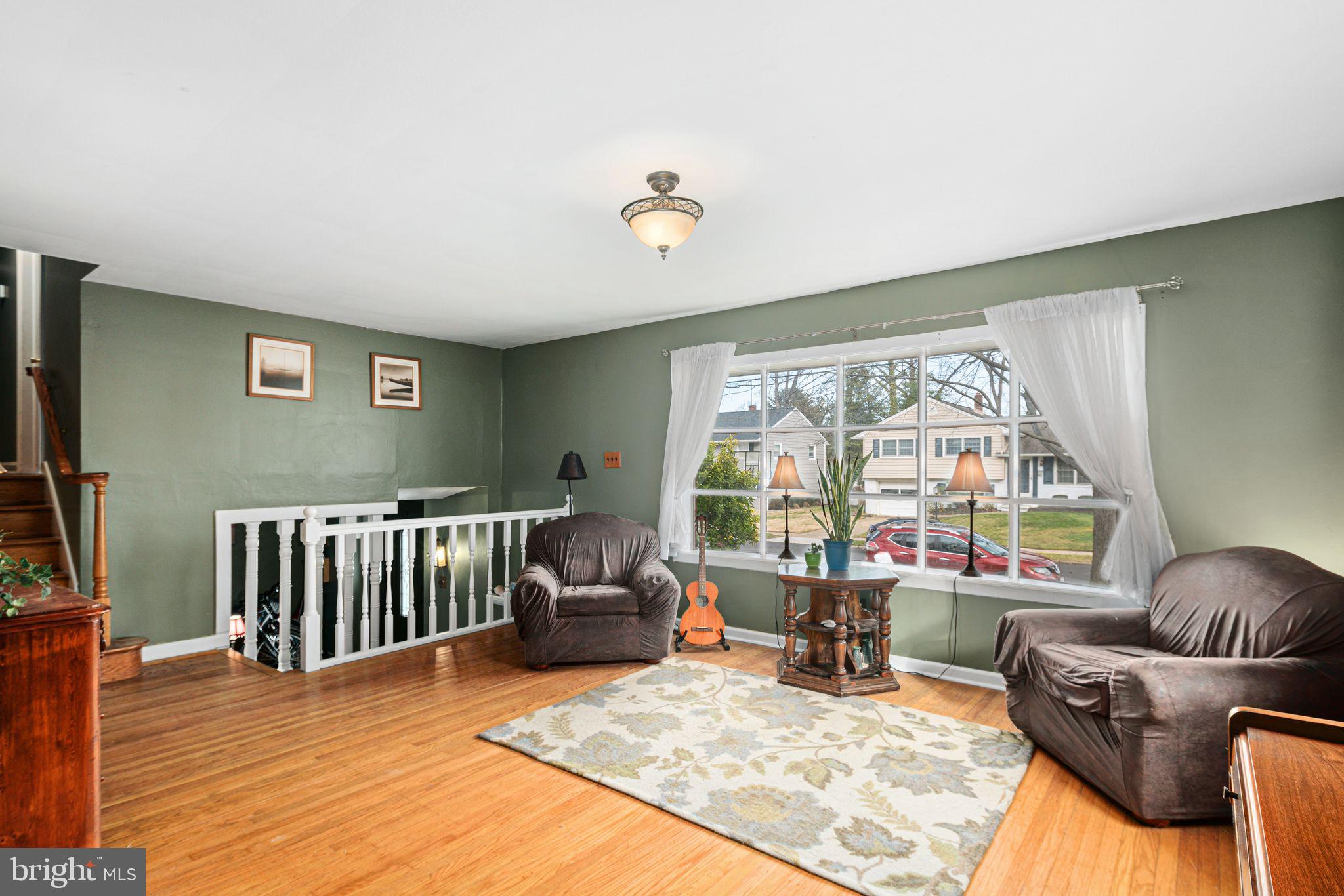1228 Chesterfield Road Haddonfield, NJ 08033 - Photo 6 of 46 a living room with furniture rug and a large window