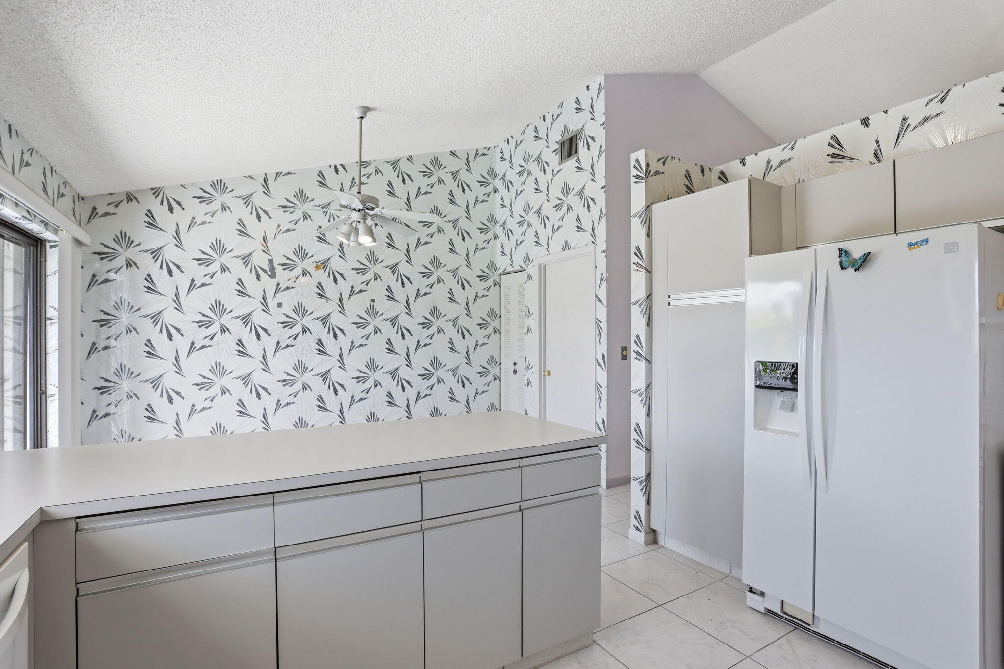 9476 El Clair Ranch Road Boynton Beach, FL 33437 - Photo 14 of 29 a view of a kitchen with cabinets
