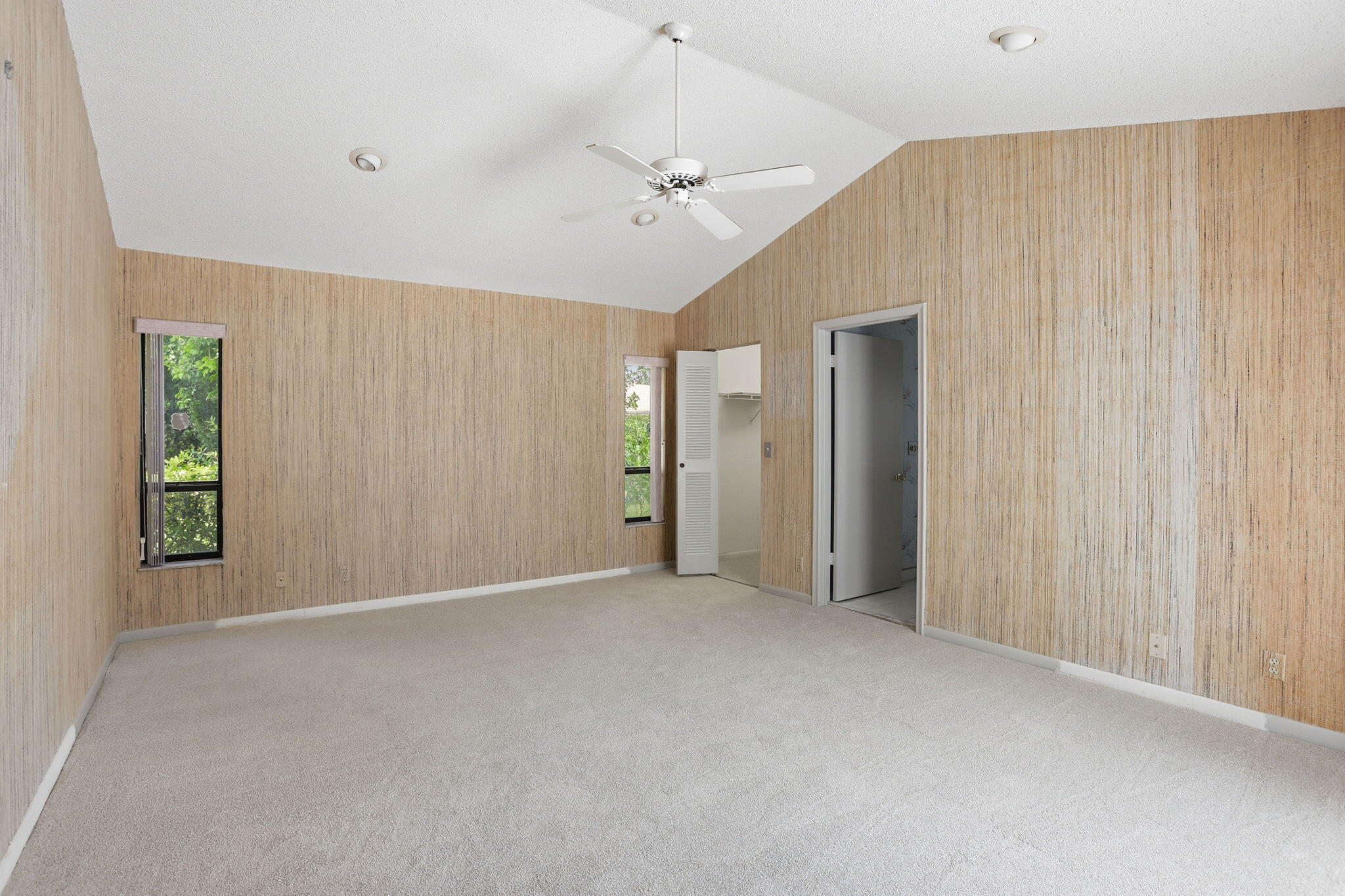 9476 El Clair Ranch Road Boynton Beach, FL 33437 - Photo 21 of 29 a view of a livingroom with a chandelier fan