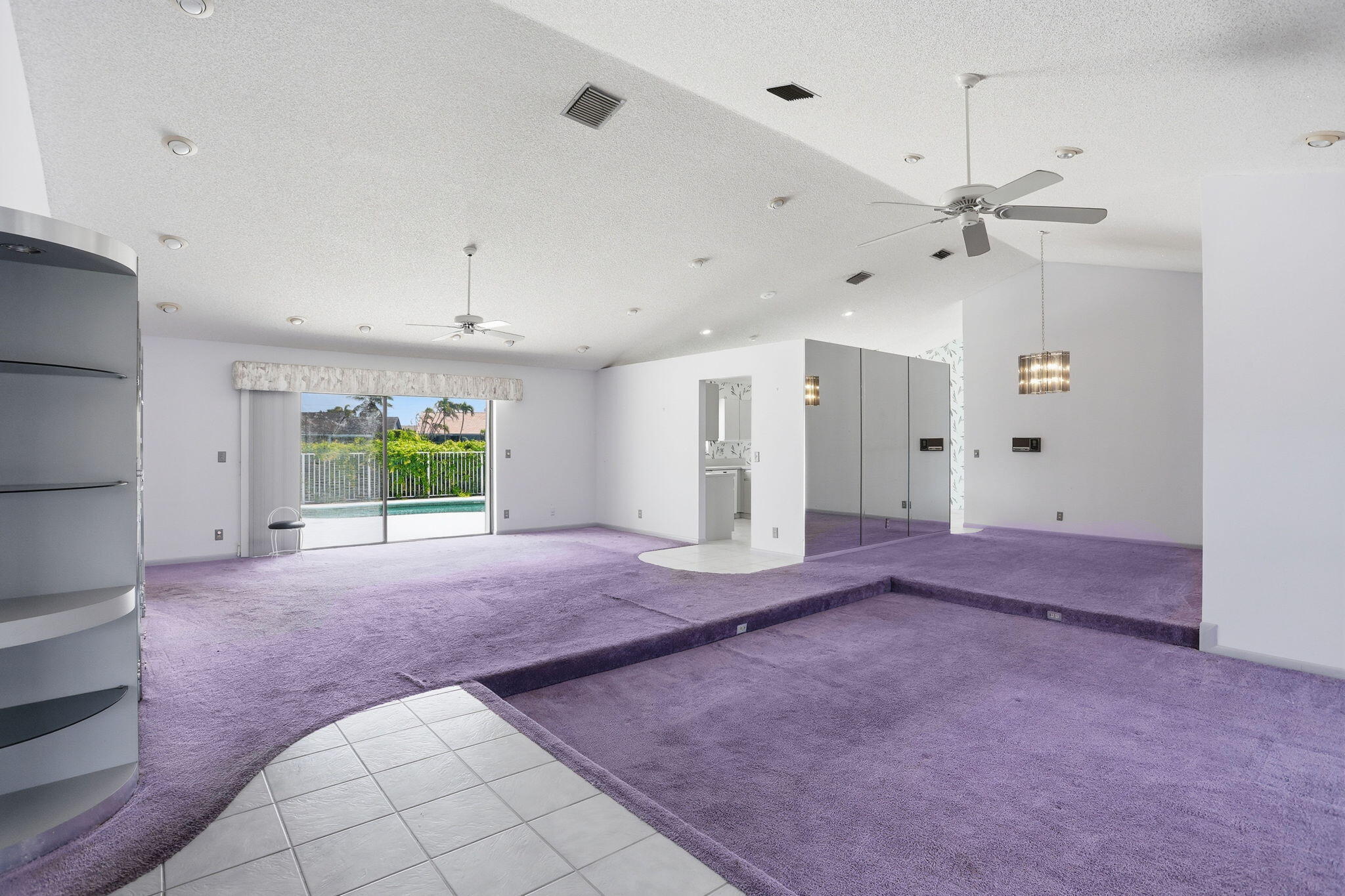 9476 El Clair Ranch Road Boynton Beach, FL 33437 - Photo 5 of 29 a view of a big room with closet and windows