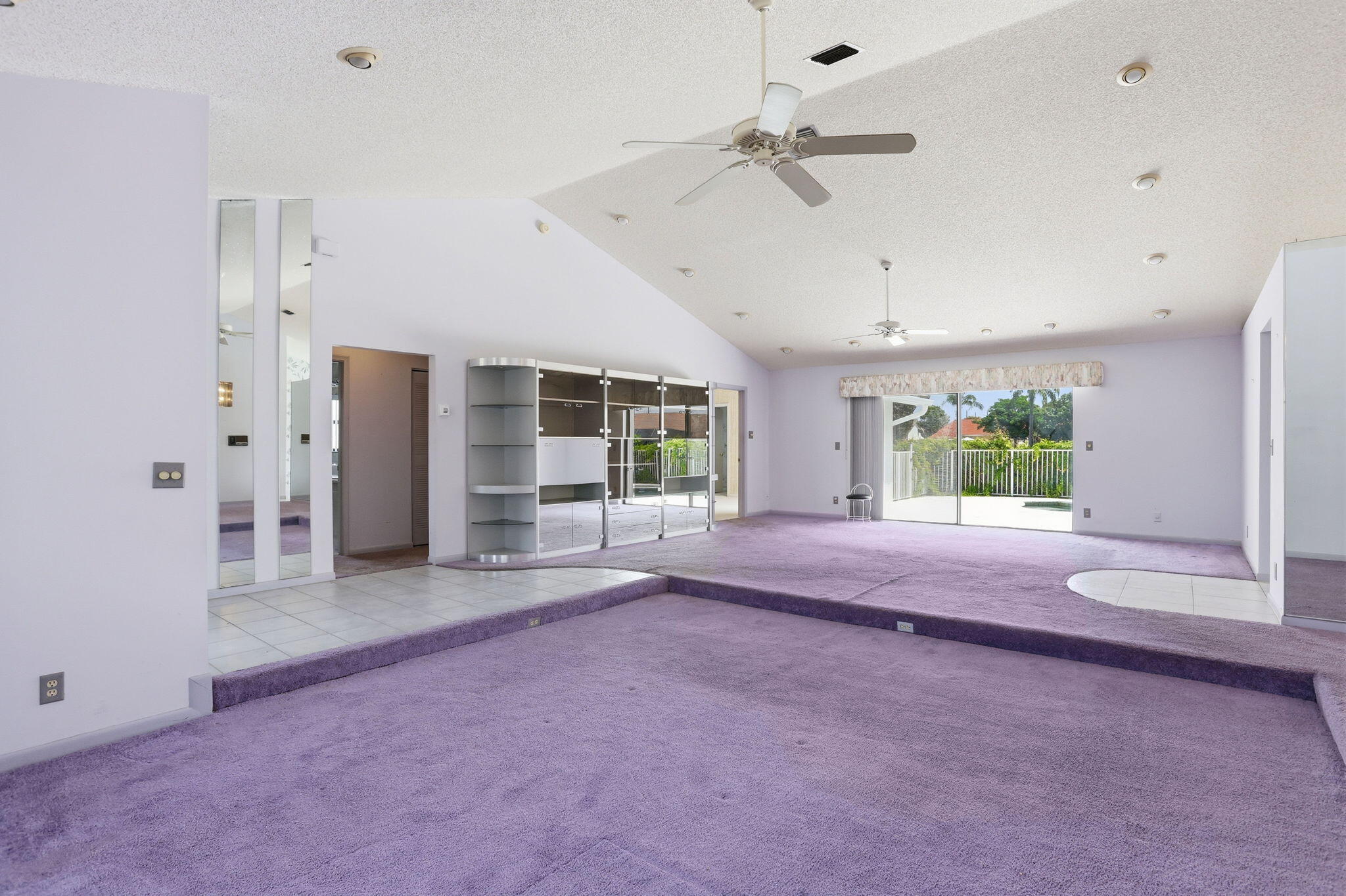9476 El Clair Ranch Road Boynton Beach, FL 33437 - Photo 6 of 29 a view of a livingroom with a fireplace and window