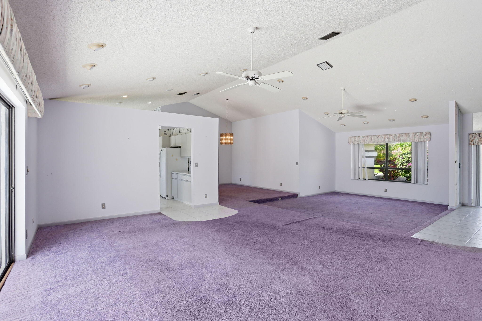 9476 El Clair Ranch Road Boynton Beach, FL 33437 - Photo 10 of 29 an empty room with closet and windows