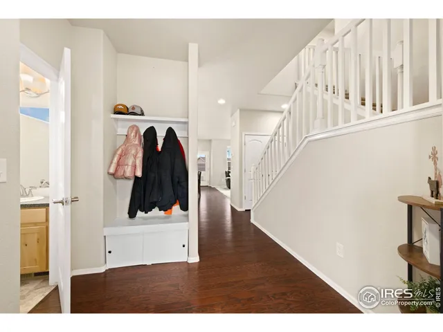 a view of entryway with wooden floor