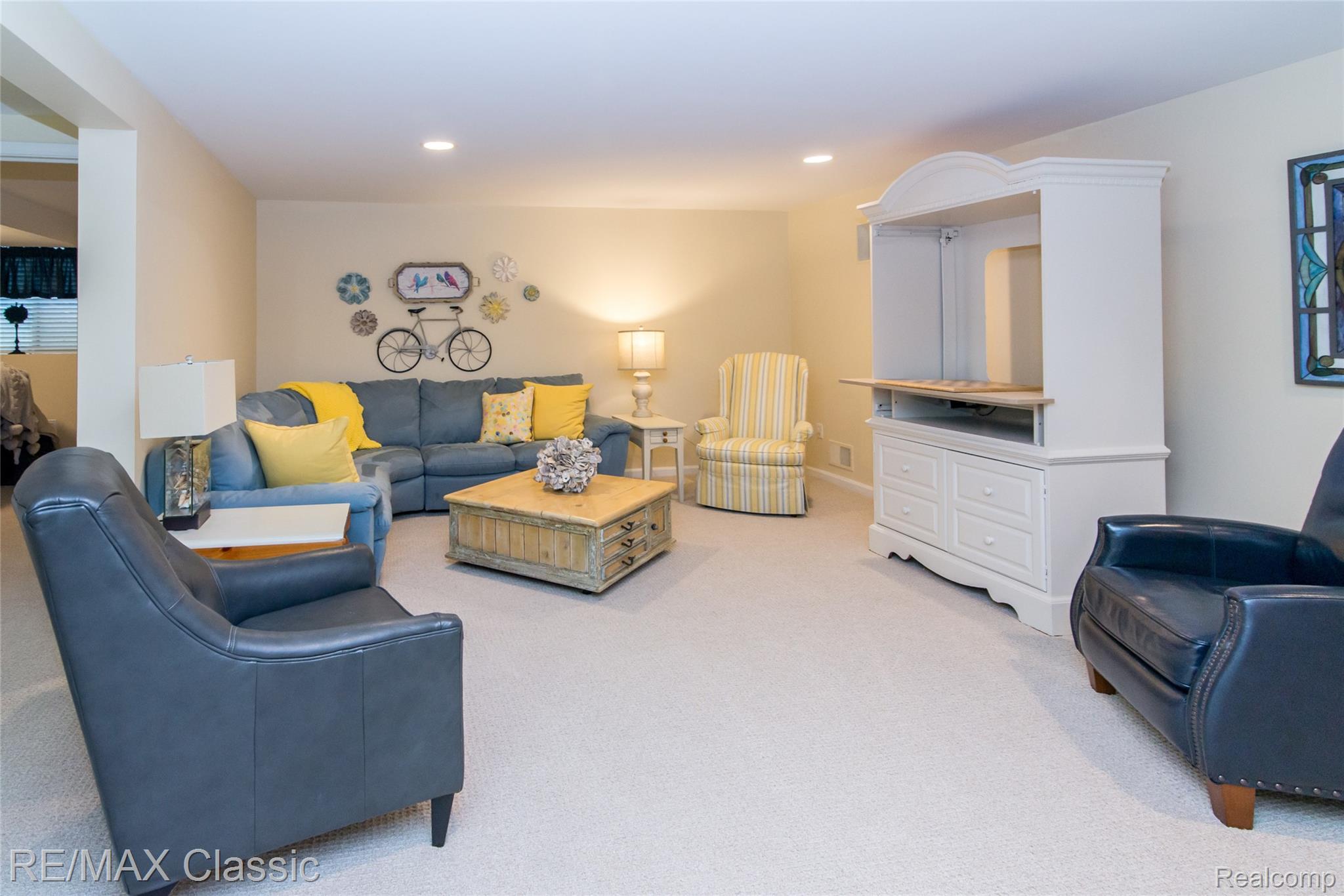 4655 Summer Ridge Drive, Unit 17 Howell, MI 48843 - Photo 25 of 34 Finished basement family room