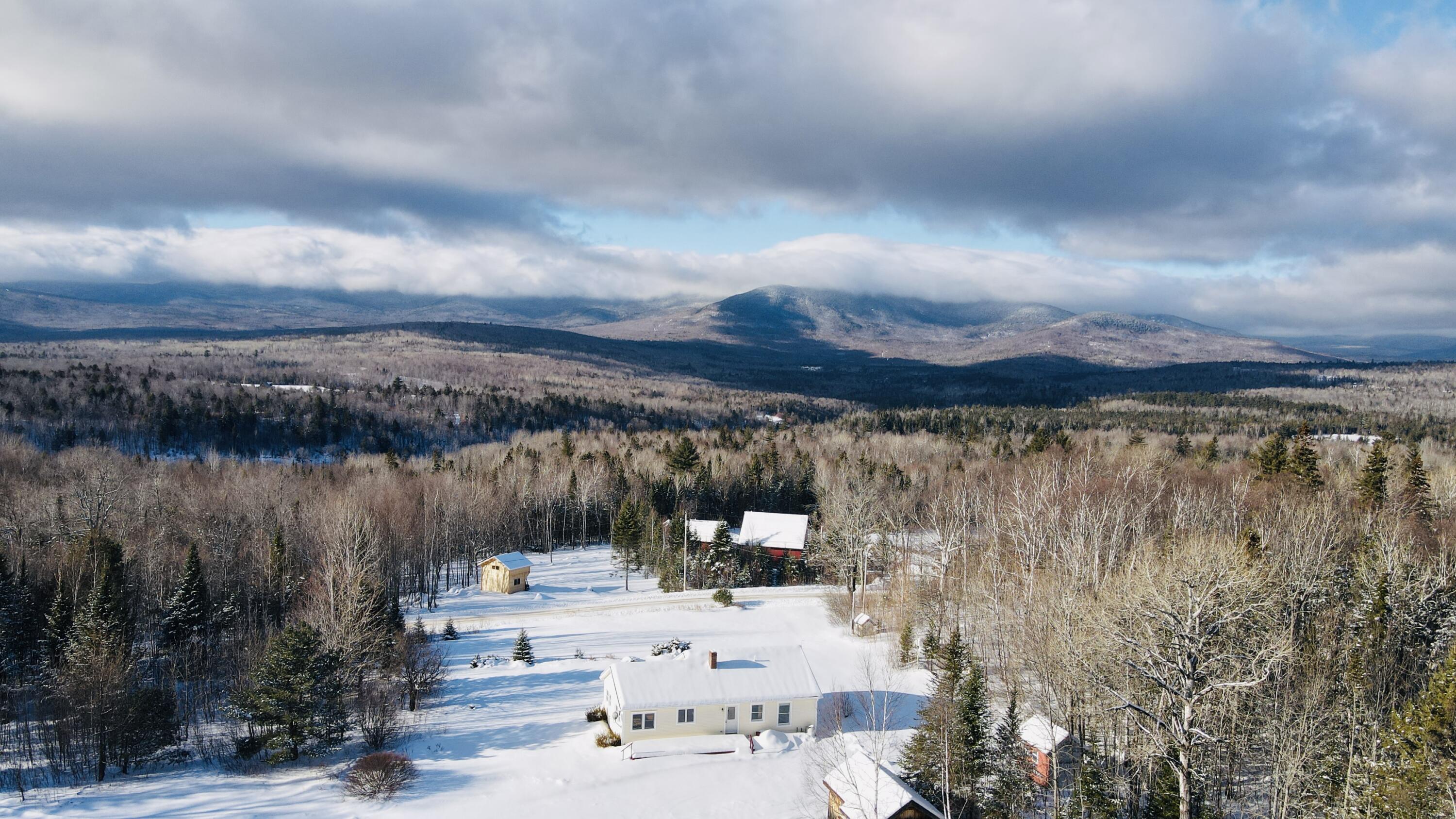 467 East Madrid Road Madrid Township, ME 04966 - Photo 2 of 63 dji_fly_20260108_133206_33_1767897132642