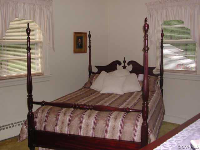 8502 Lansdowne Road Richmond, VA 23229 - Photo 7 of 9 a bedroom with a bed and a window