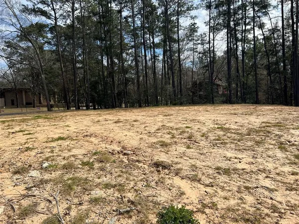 a view of empty room with trees