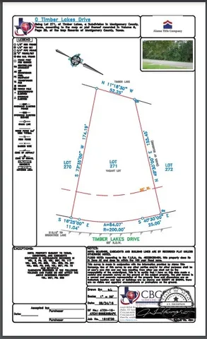 a view of a green field with trees