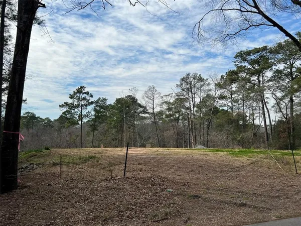 a view of a park with welcome board
