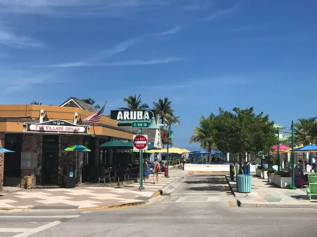 a view of street with stores