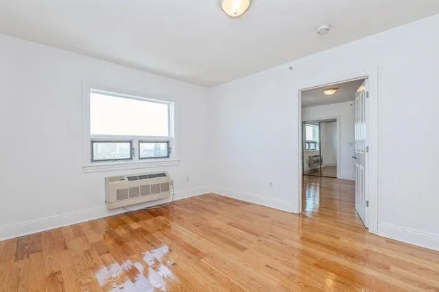 wooden floor and windows in a room