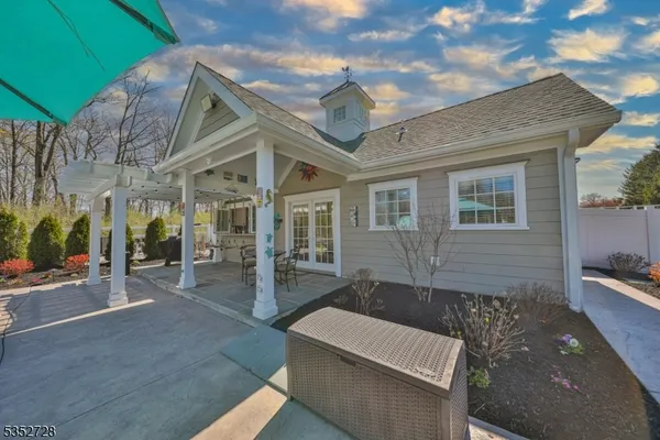 a front view of a house with glass windows