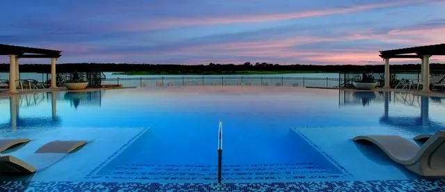 a view of a lake with a porch