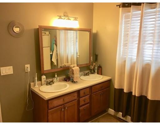 217 Reeves Street Fall River, MA 02721 - Photo 6 of 12 a bathroom with a sink and a mirror
