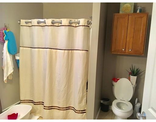 217 Reeves Street Fall River, MA 02721 - Photo 7 of 12 a bathroom with a sink and a mirror