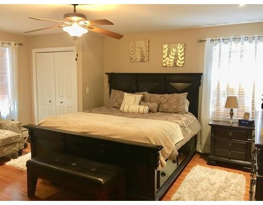 217 Reeves Street Fall River, MA 02721 - Photo 8 of 12 a bedroom with a bed and a dresser