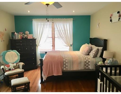 217 Reeves Street Fall River, MA 02721 - Photo 9 of 12 a bedroom with a bed and window