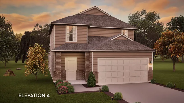 a view of backyard of house with green space